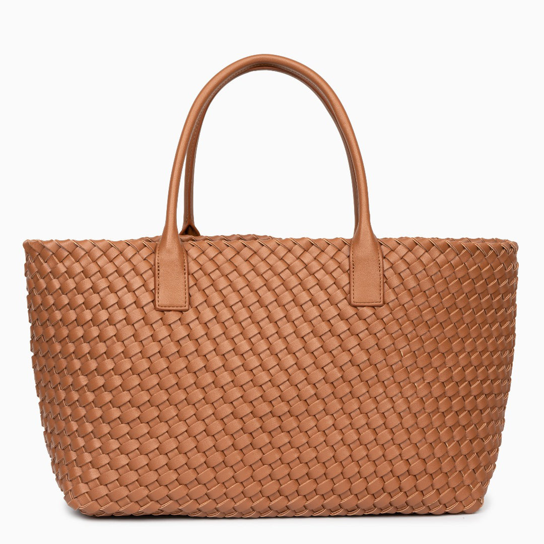 Brown woven handbag with leather handles on a white background