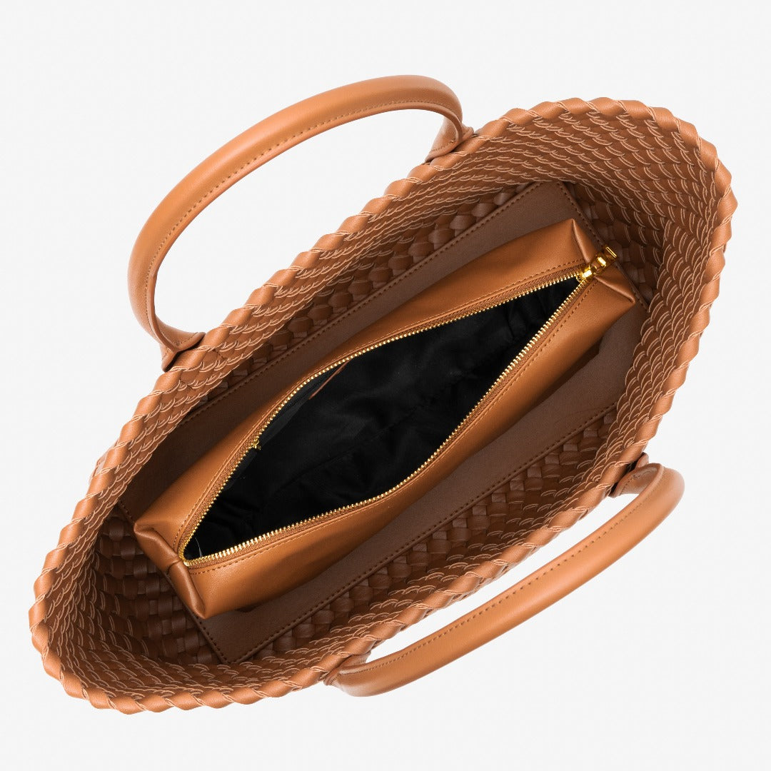 Brown woven handbag with a zipper on a white background