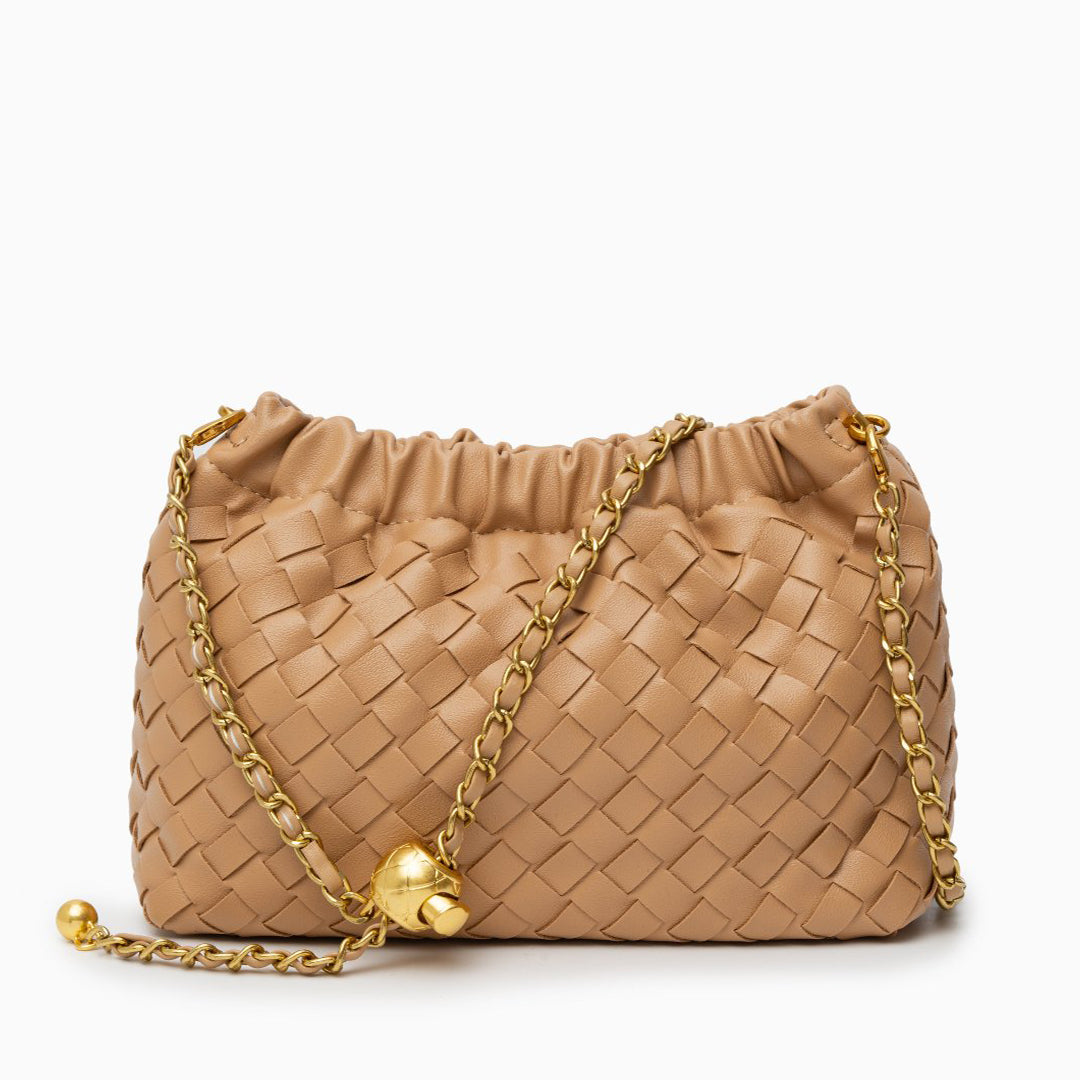 Beige woven handbag with gold chain on a white background