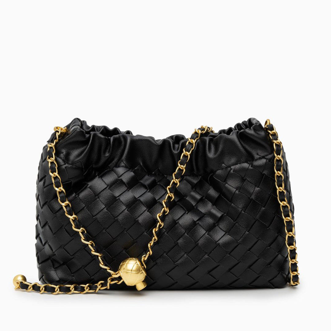 Black woven handbag with a gold chain on a white background