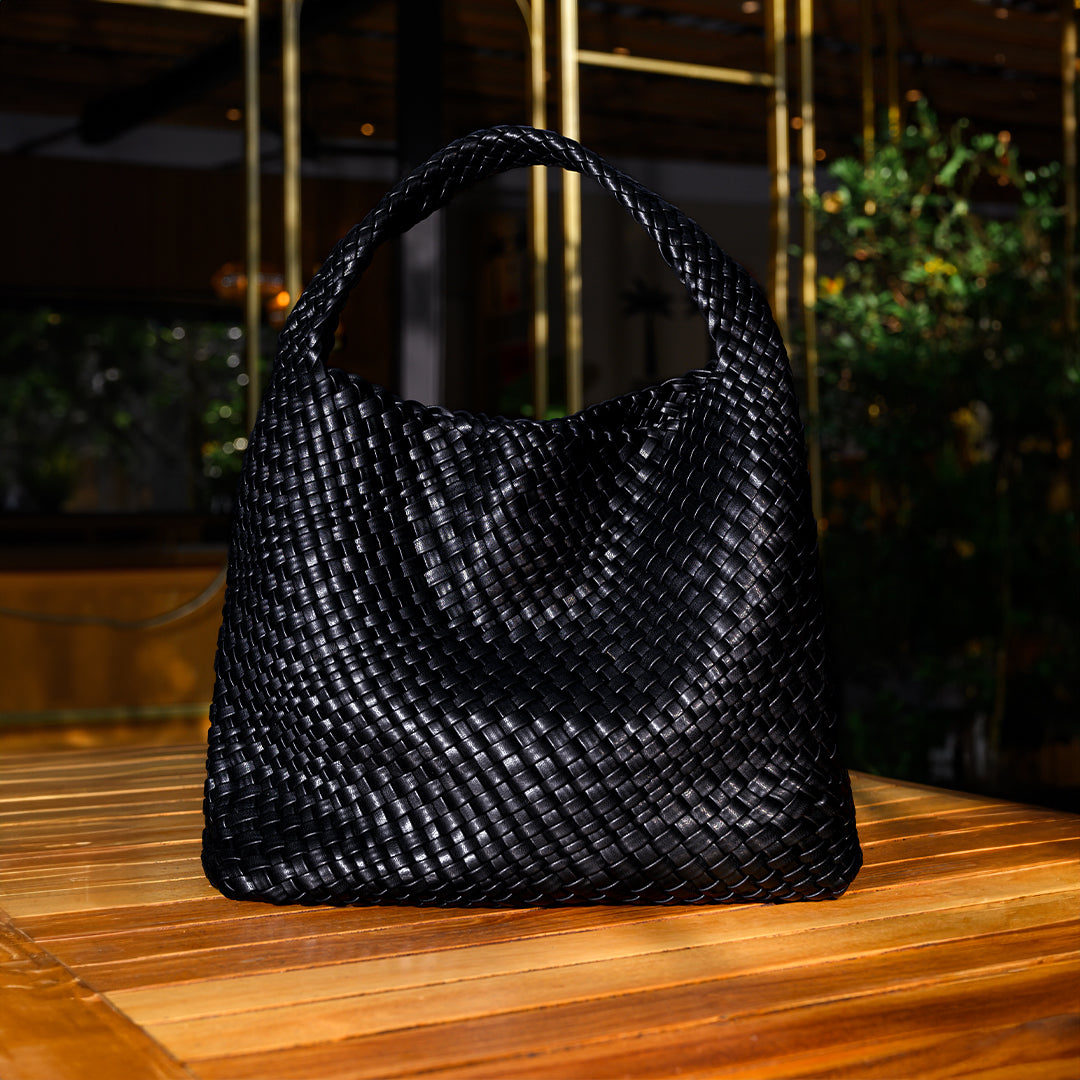 Elegant black vegan leather shoulder bag with extra-large capacity, featuring a sleek design and comfortable shoulder strap. 6