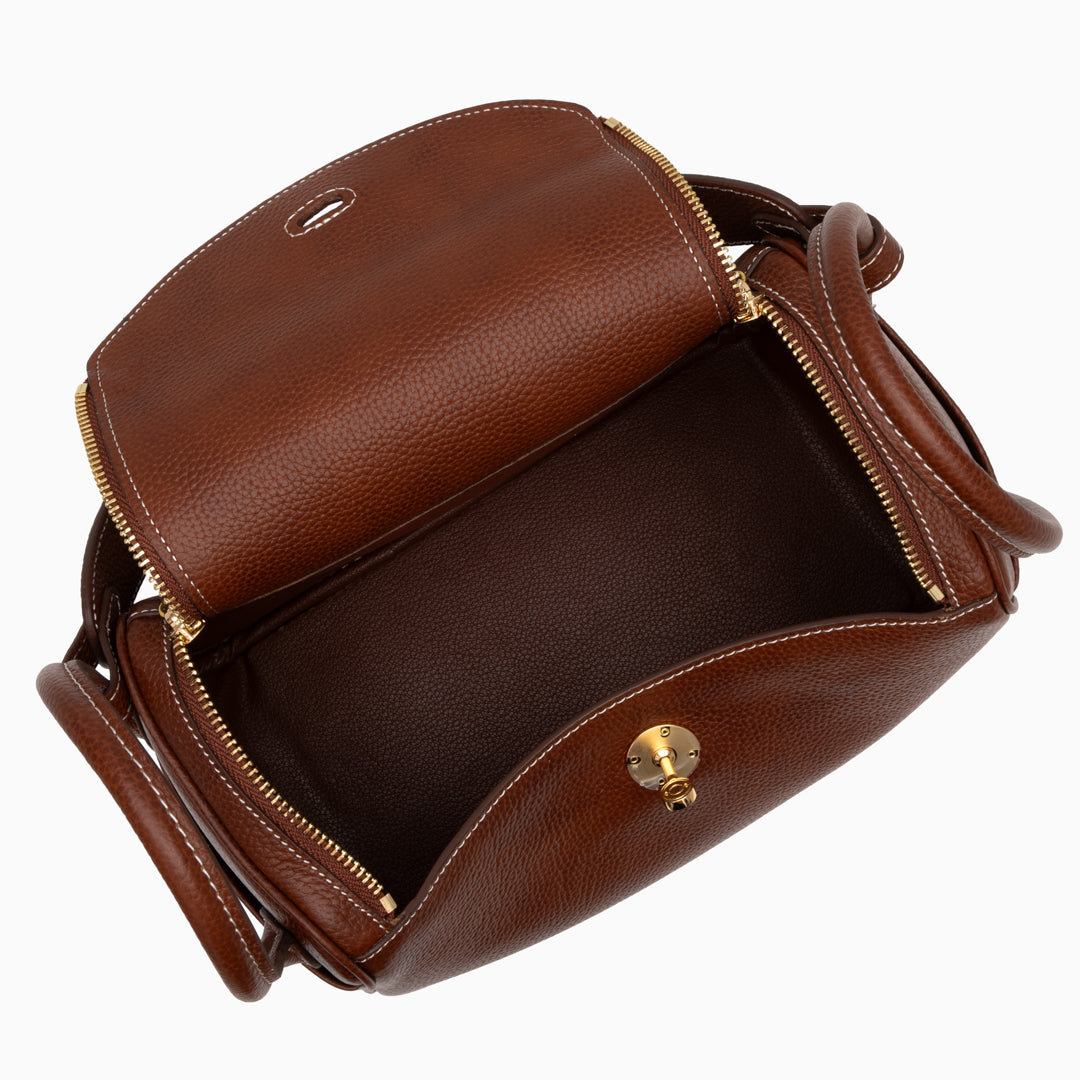 Sophia Luxe Mini Shoulder Bag in black genuine leather with a curved flap design. 3