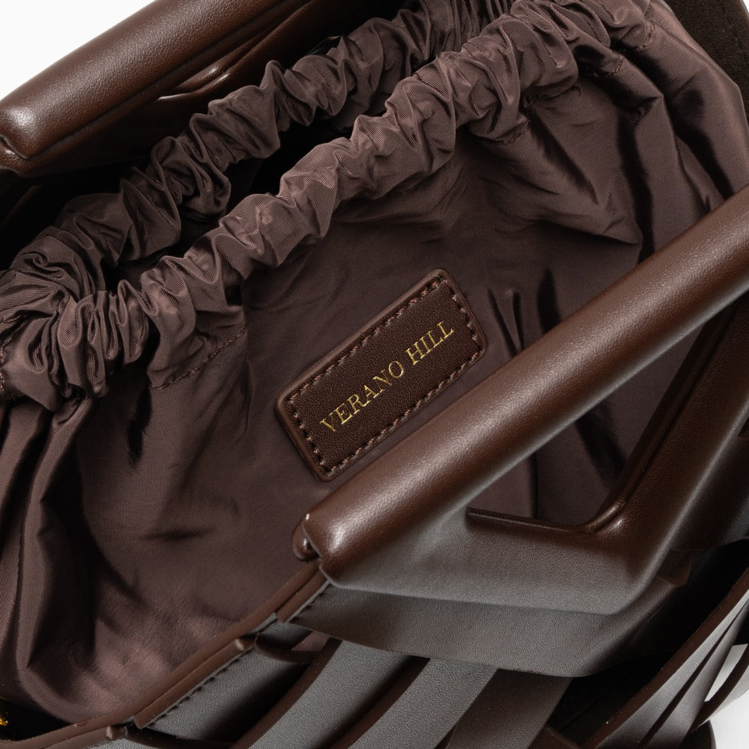 Sophia woven handbag featuring an inverted triangle handle and elegant fabric design. 3
