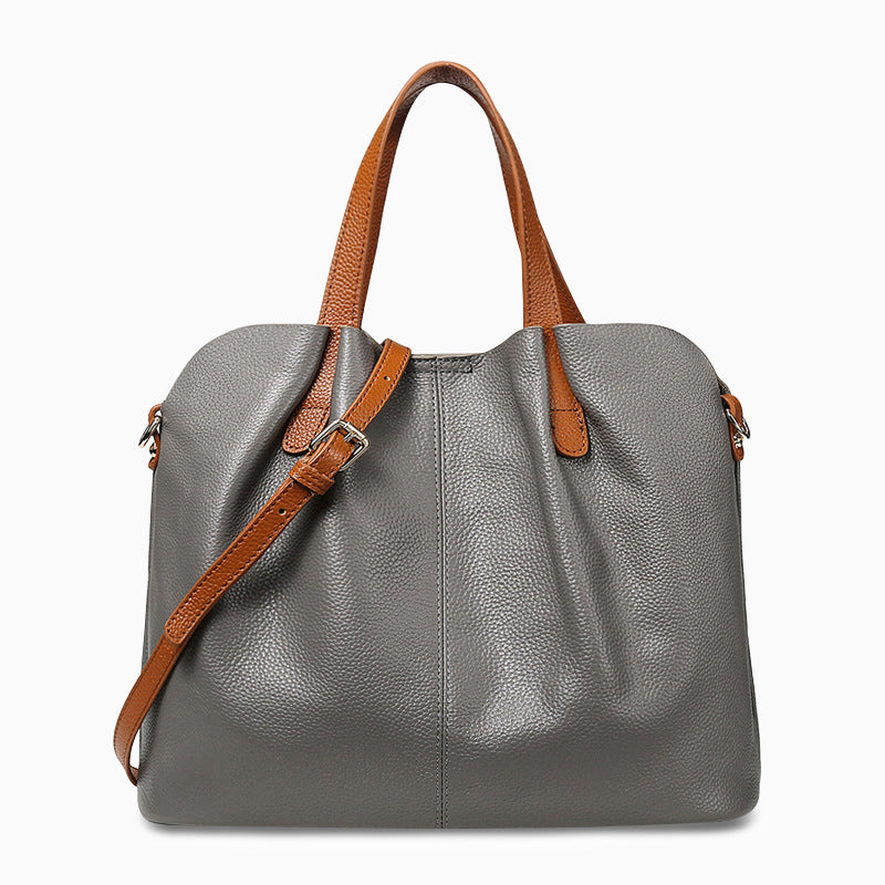 A stylish multi-colour tote bag made of luxe leather, featuring versatile carry options. 5