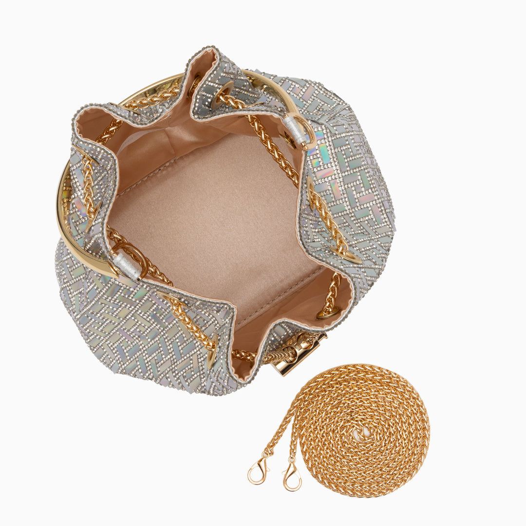 Gold and silver handbag with a chain strap on a white background