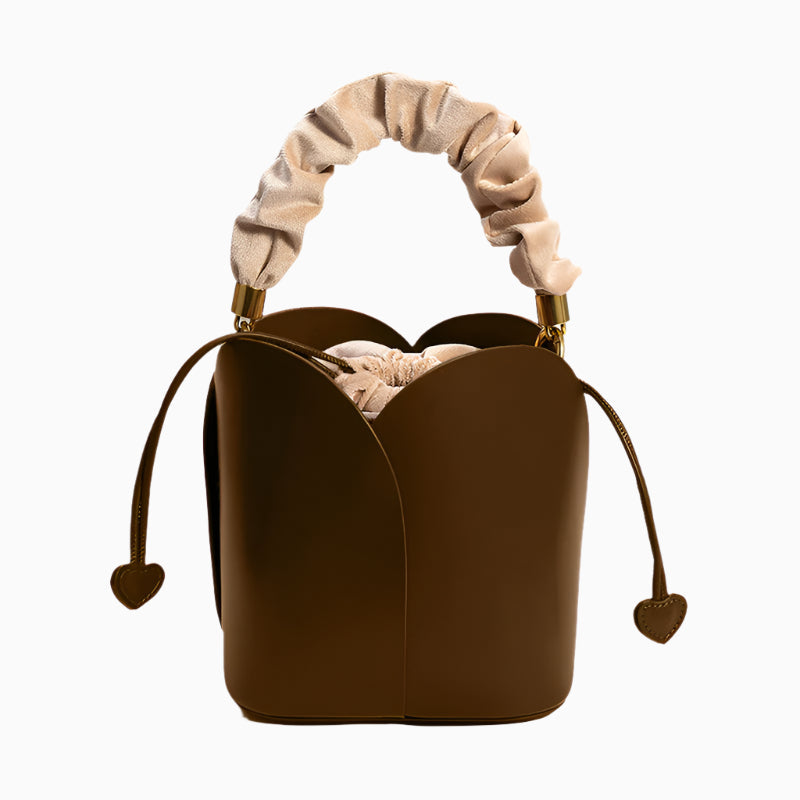Charming Lily Bucket Handbag in Burgundy featuring a heart-shaped closure. 6