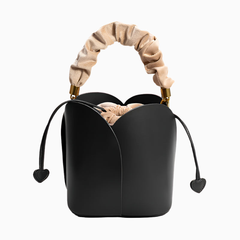 Charming Lily Bucket Handbag in Burgundy featuring a heart-shaped closure. 9