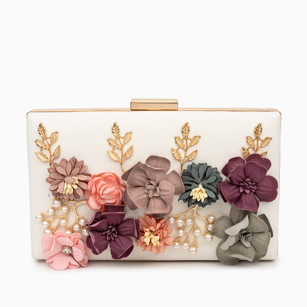 A stylish vegan-friendly clutch bag in white, red, pink, and beige, designed for evening use. 0