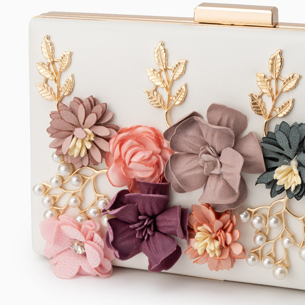 Chic Rose Clutch Bag in white, red, pink, and beige, showcasing a stylish vegan-friendly design, perfect for evening occasions. 1