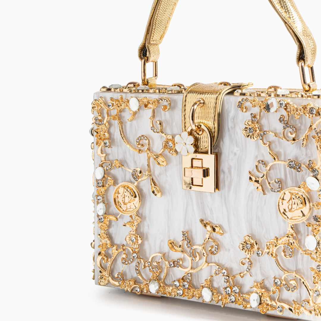 Elegant floral acrylic box handbag with gold accents, featuring a stylish design and vegan-friendly materials. 1