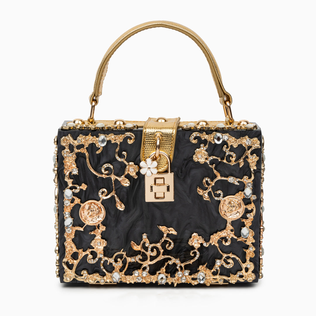Elegant floral acrylic box handbag featuring gold accents, designed to be vegan friendly. 11