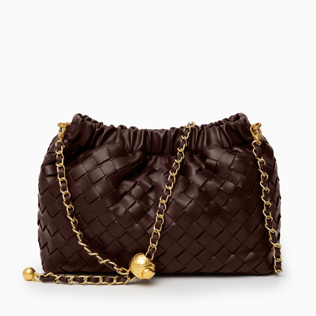 Brown woven handbag with gold chain on a white background