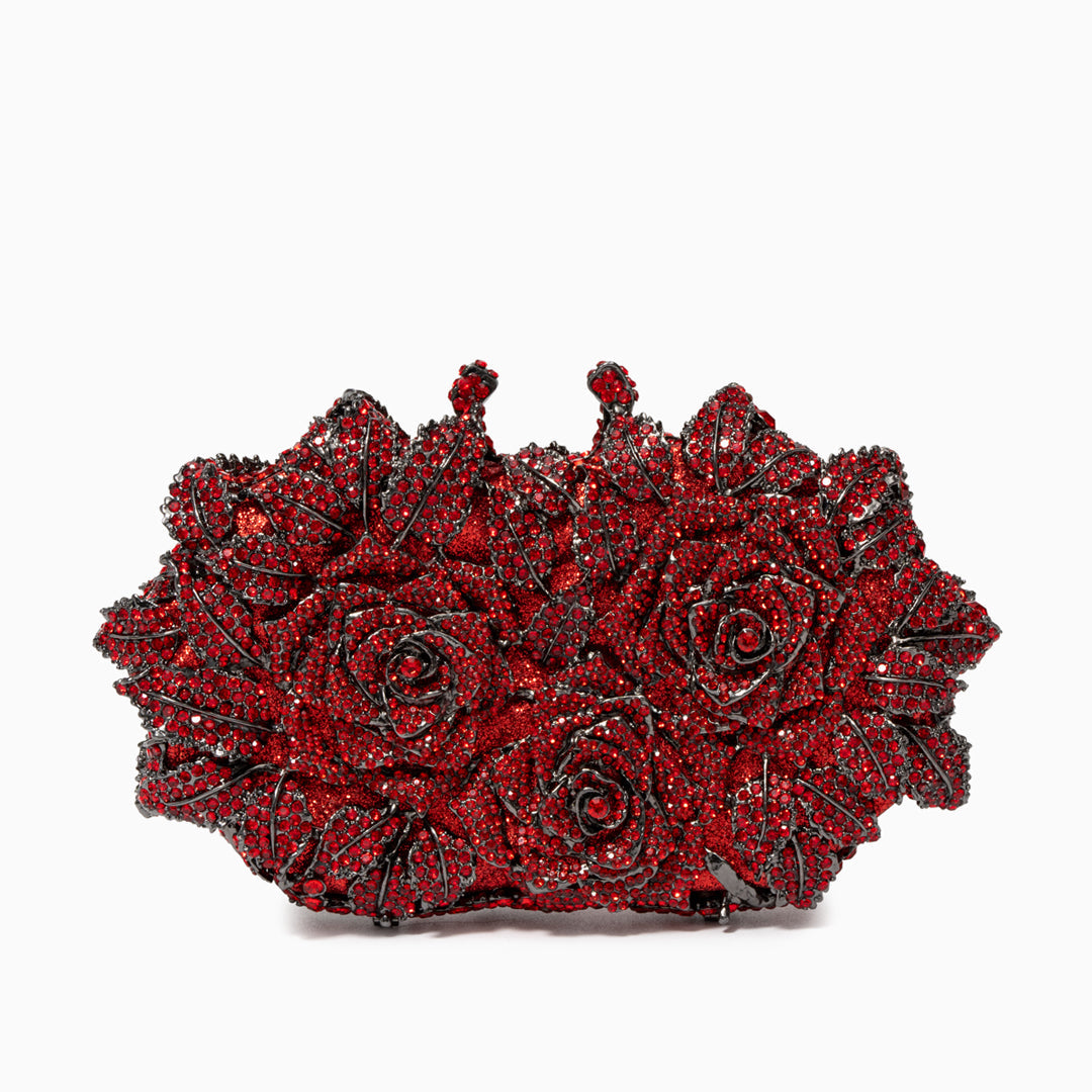 Red rose-shaped clutch with intricate detailing on a white background