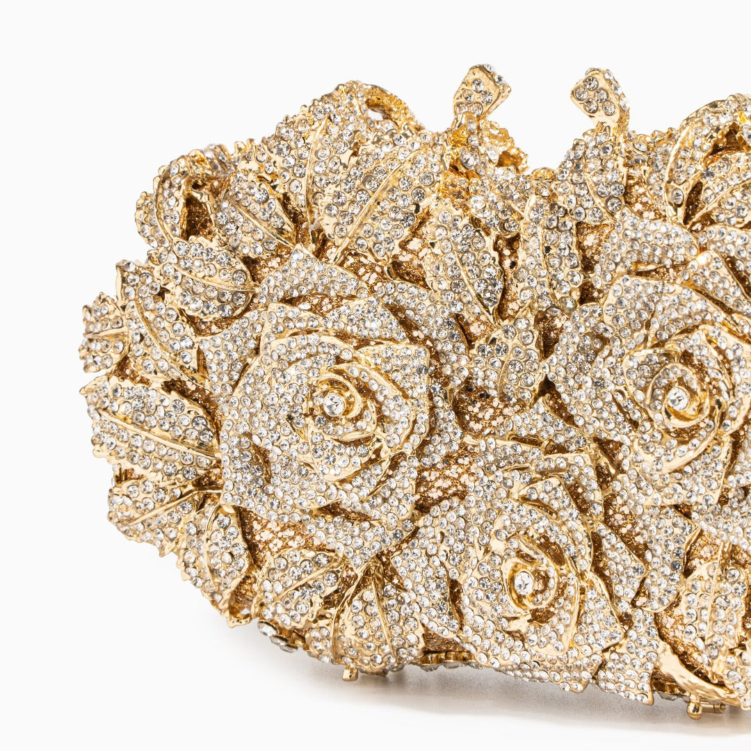 Sophia Rose Gold Clutch Bag made of vegan leather with sparkling rhinestone accents. 1